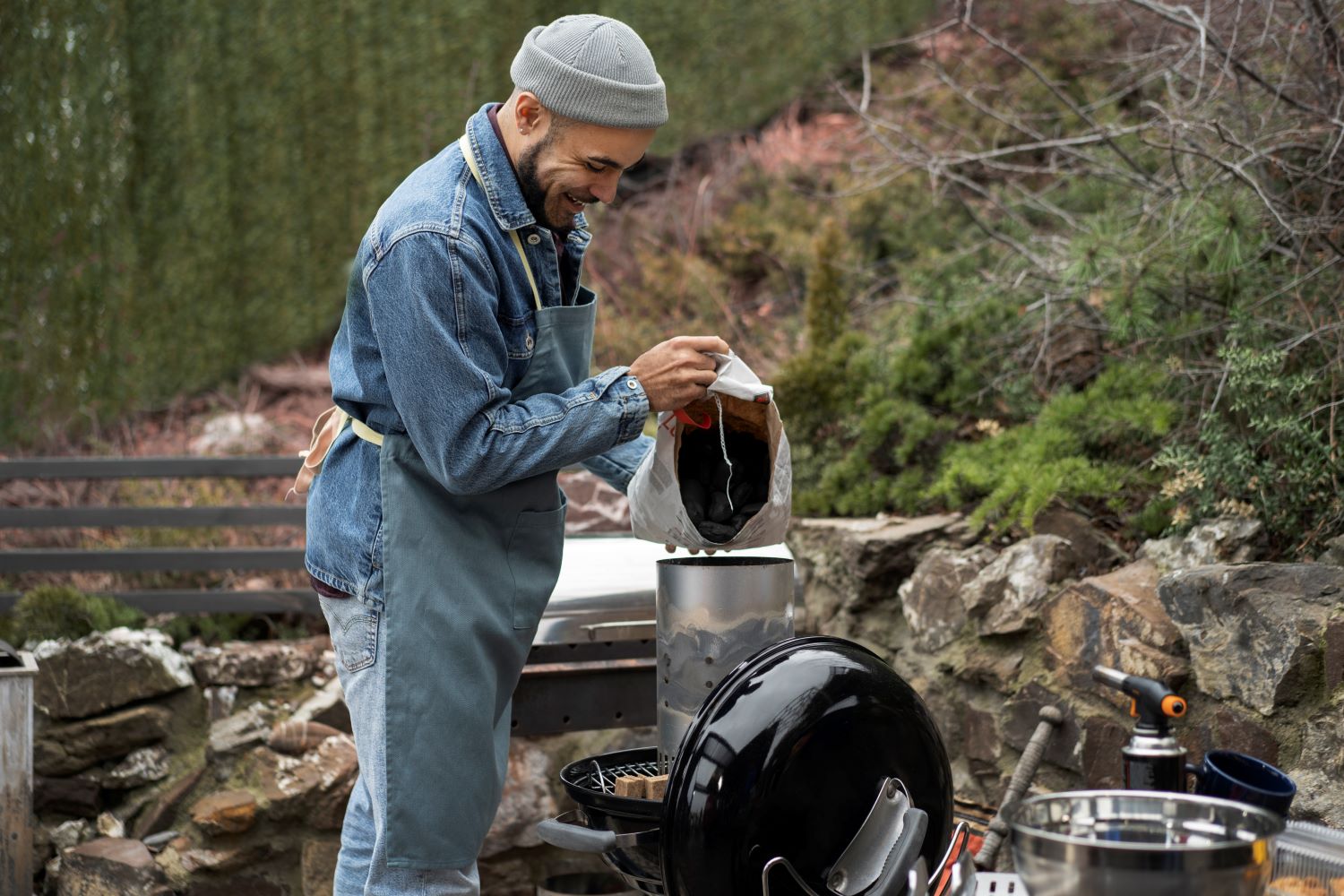 man-preparing-barbeque-cooking